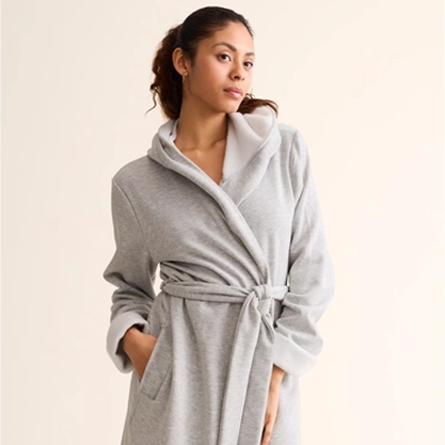 woman wearing grey robe
