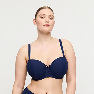 woman wearing a blue bikini top